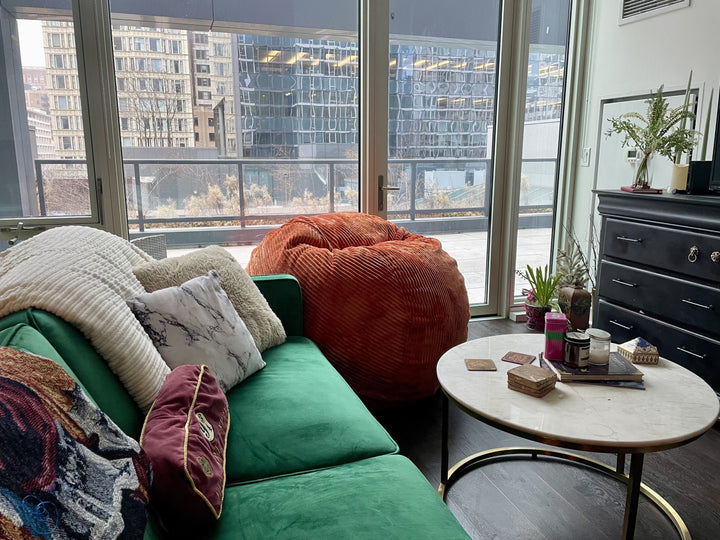 A CordaRoy's bean bag chair in an apartment living room. 