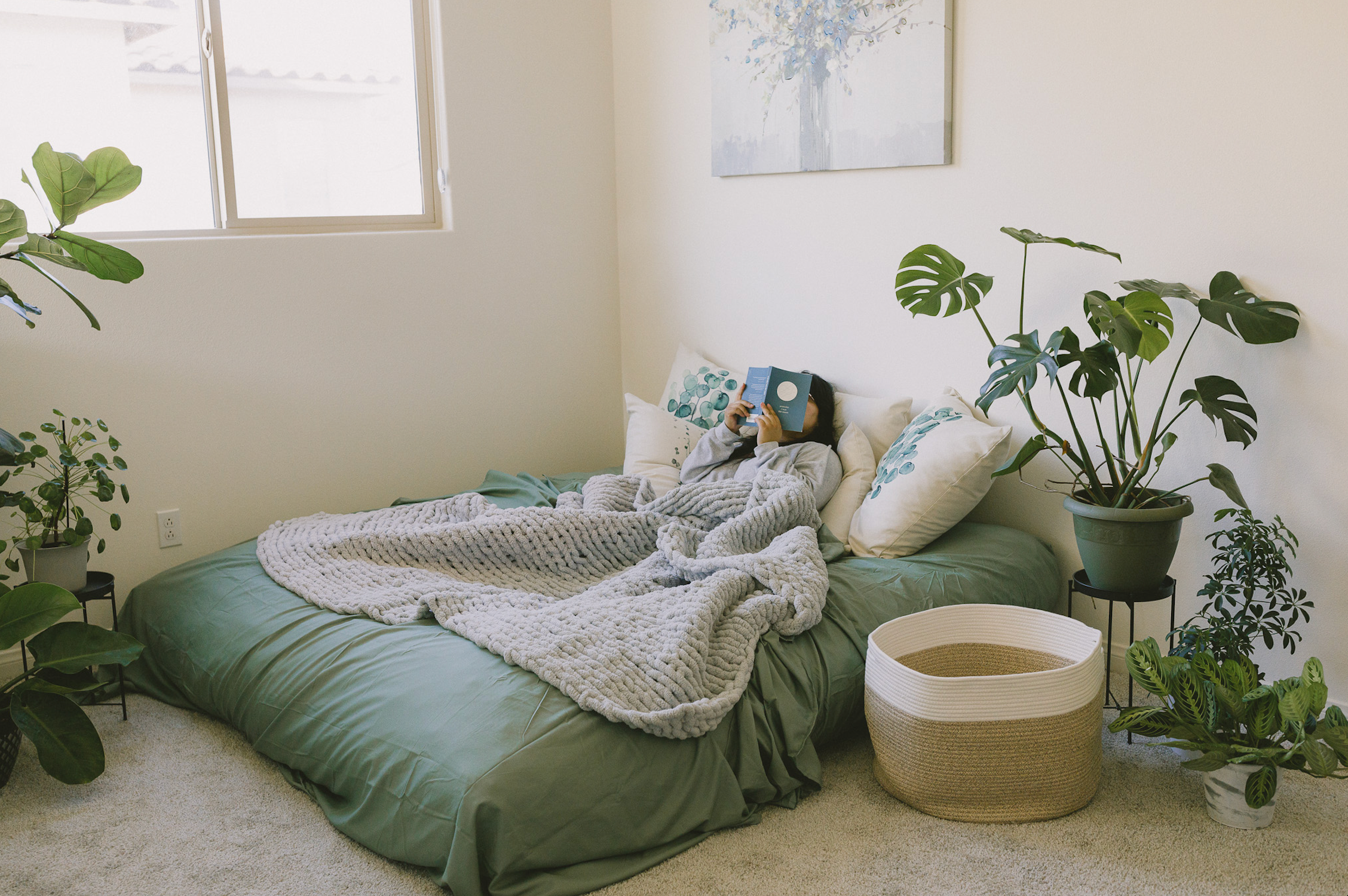 A guest bedroom with a CordaRoys Convertible Chair.