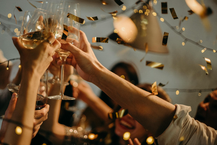 A group of people toasting to the New Year