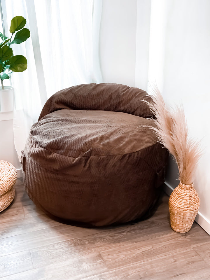 An image of a CordaRoy's bean bag chair with a brown cover. 