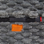 Gray textured nest cover with a CordaRoy's label on a black background