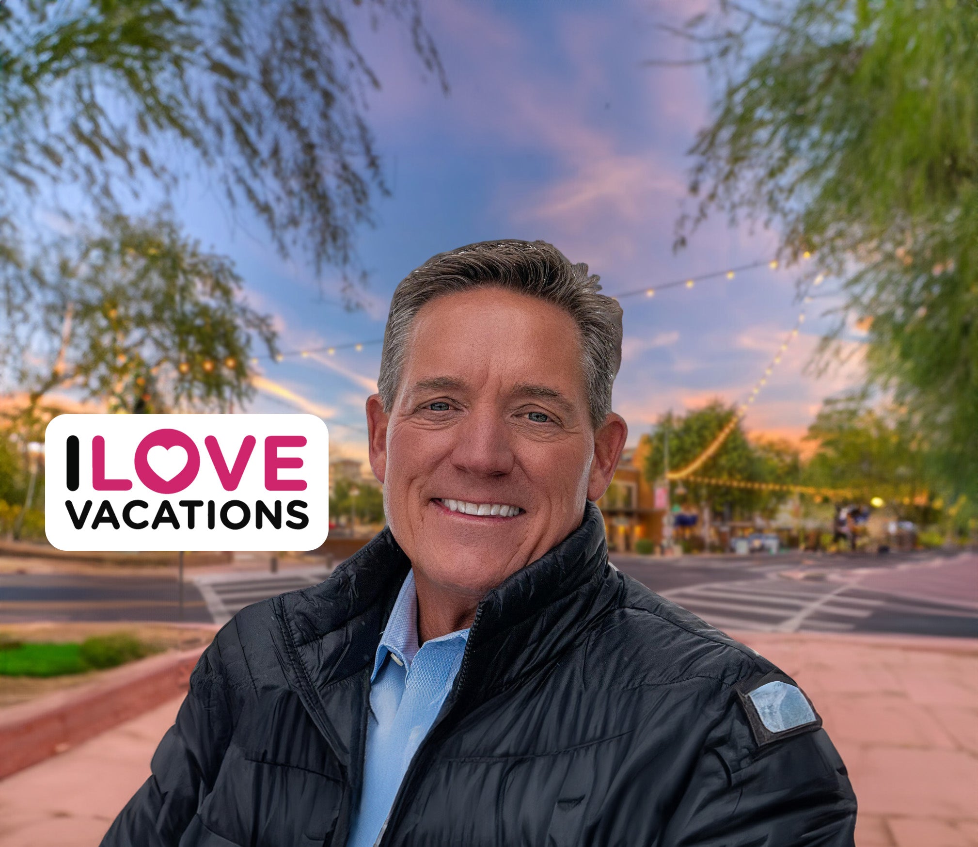Man smiling with I Love Vacations logo