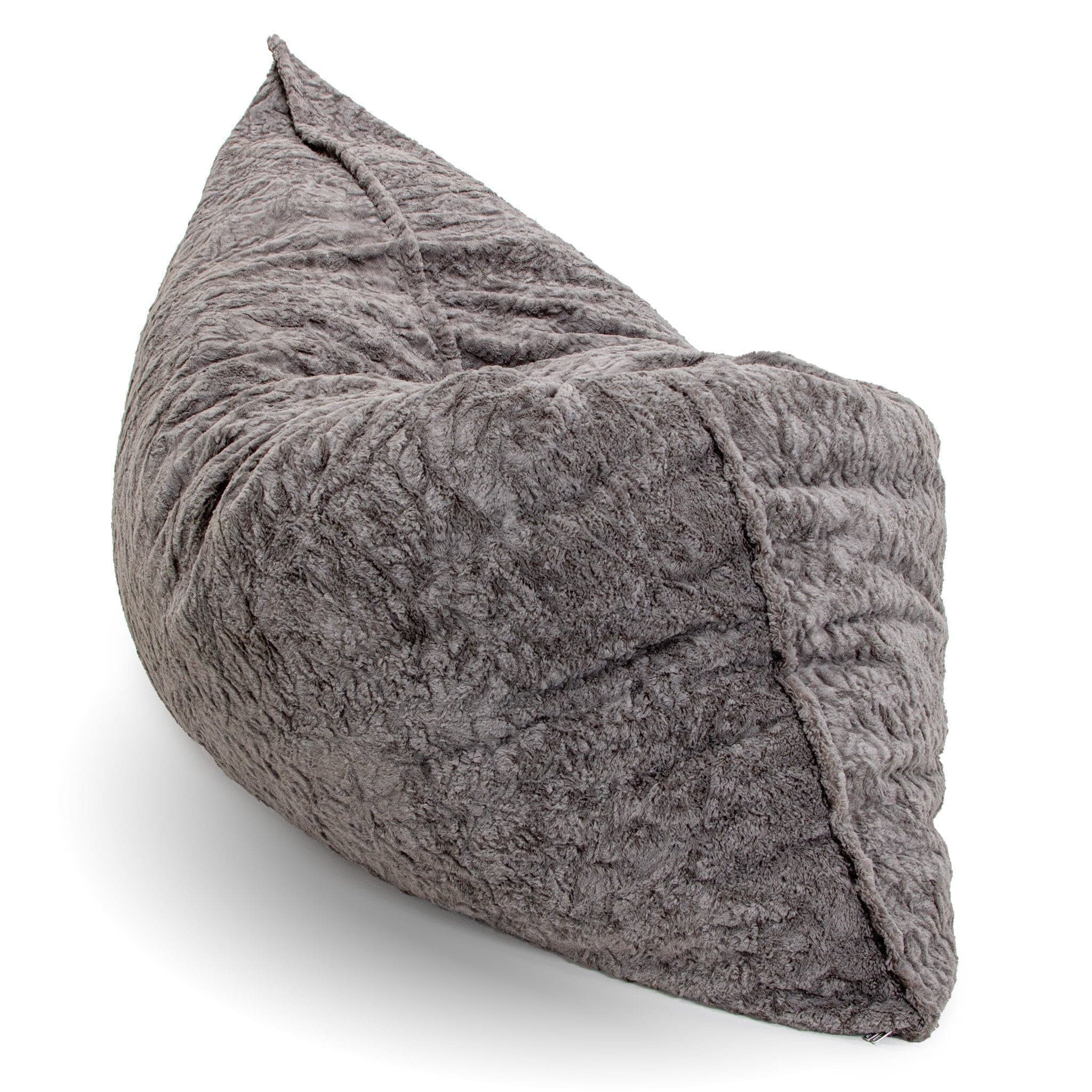 A giant pillow lounger by cordaroys in gray faux fur.