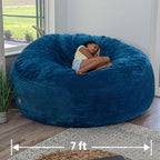 A girl sleeps in a cordaroys plush corduroy giant bean bag chair.